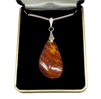 Sterling silver faceted amber pendant with