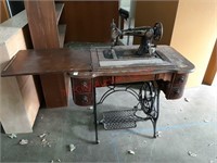 Empress sewing machine in cabinet