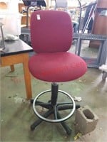 Rolling adjustable bar height office chair.