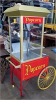 large popcorn machine with rolling cart