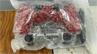 2 pack red/silver PS3 controllers