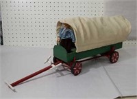 Covered wagon with driver