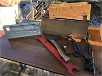 Wooden box, pry bar, tin snips, magnet