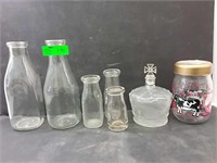 Glass milk bottles, whiskey decanter