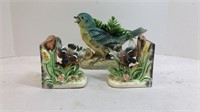 Two ceramic goose ornaments and bird with