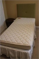 TWIN BED-OLD MATTRESS-GREEN COVERED HEADBOARD