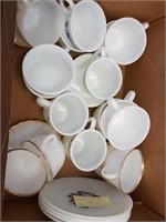 box of cups and saucers