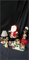 Stuffed santa with tea light candle snow globes