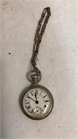 Vintage pocket watch with training the cover