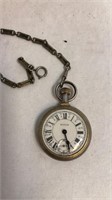 Vintage pocket watch with train on the cover