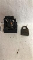 1976 liberty bell bank and a Yale padlock