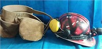 Helmet with light and earmuffs with leather tool