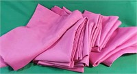 Five bright pink rod pocket curtain panels -