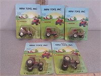 5 - 1/64 scale hesston toy tractors