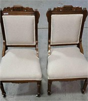 Two antique upholstered dining chairs with w