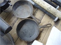 2 SMALL CAST IRON PANS