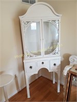Petite glass door cabinet with 3 drawers