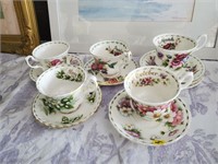 5 teacups and saucers