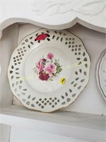 Rose plate hangs with ribbon