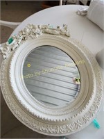 White painted frame mirror with Cherubs on top