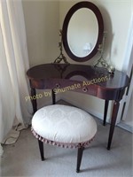 Dark wood vanity w/mirror and upholstered stool