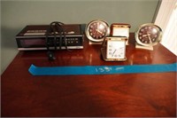 5 assorted clocks