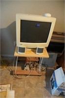 computer monitor with table and 2 speakers