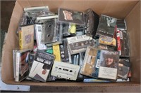 Box of Misc Cassettes & CD's