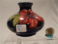 Moorcroft Pottery vase, Hibiscus pattern, incuse