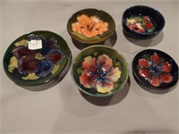 Five various Moorcroft small dishes, the largest