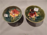 Two Moorcroft Pottery footed bowls, impressed