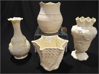 Four Belleek porcelain vases
