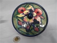 Moorcroft Pottery covered bowl, Orchids, 6 1/2" d.