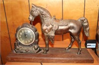 Cast Metal Lincoln Clock with Horse on Wooden