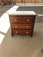 Nice vintage 3-dwr. marble top dresser w/C-I Wheel