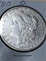 1880 O Morgan silver dollar