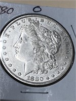 180 O Morgan silver dollar