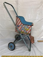 Vintage child’s toy metal stroller missing front