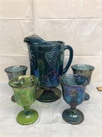 Carnival glass pitcher and 4 cups