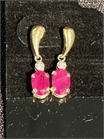 14 karat gold Ruby and diamond earrings. Value