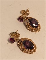 Pair Of 14k Gold Earrings With Purple Stones