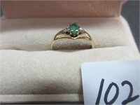 LOVELY 10K RING WITH GREEN CENTER STONE-NOTE