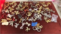 Collection of (75) assorted brooches
