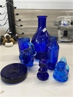Blue Glass Vase And Figurines