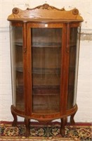 Oak Curio Cabinet w/ curved glass front &