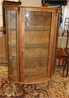 Oak Curio Cabinet by Ebert's curved front glass &