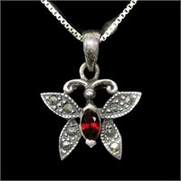 Sterling silver oval cut garnet and marcasite