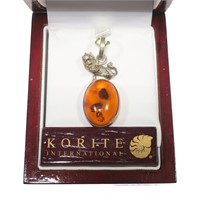 Sterling silver amber pendant with figural lion