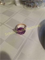 Large purple stone ring. Cant make out mark.