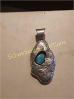 Silver and turquoise pendant. Unmarked